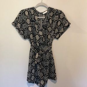 Lush black/grey romper. Size small. New w/o tags.